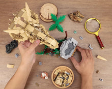 Laden Sie das Bild in den Galerie-Viewer, 2-in-1 Dinosaurier Fossil Klemm-Baustein Spielzeug mit 714 Bausteinen