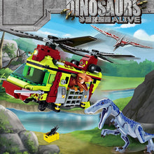 Laden Sie das Bild in den Galerie-Viewer, Jurassic Park Dinos mit Transporthubschrauber Baustein Set 585 Teile kaufen - Dinosaurier.store